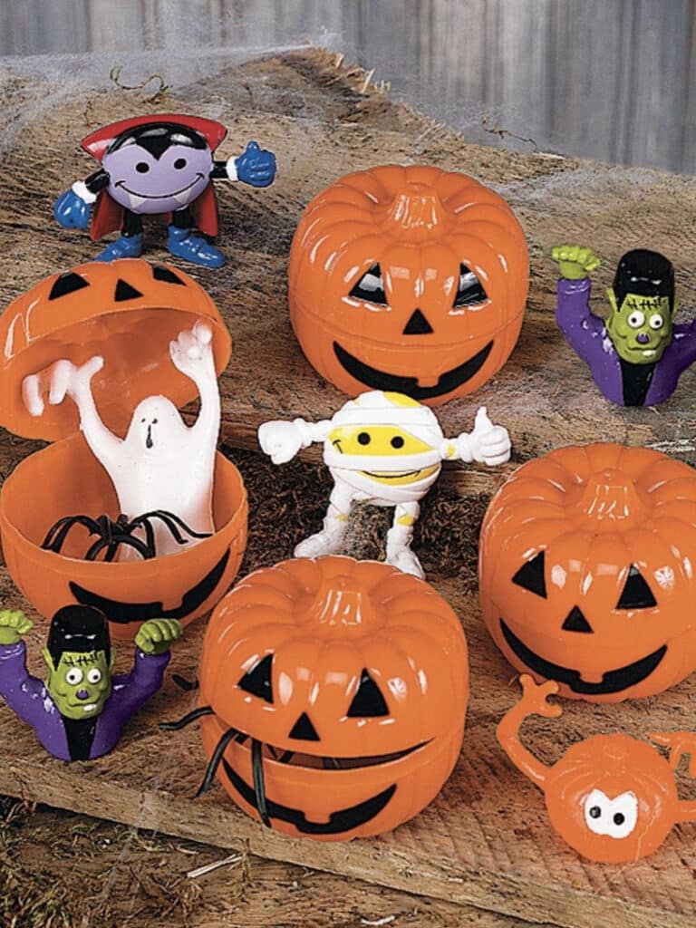 Plastic pumpkins full of candy and toys is a great for handing out candy when you are not home.