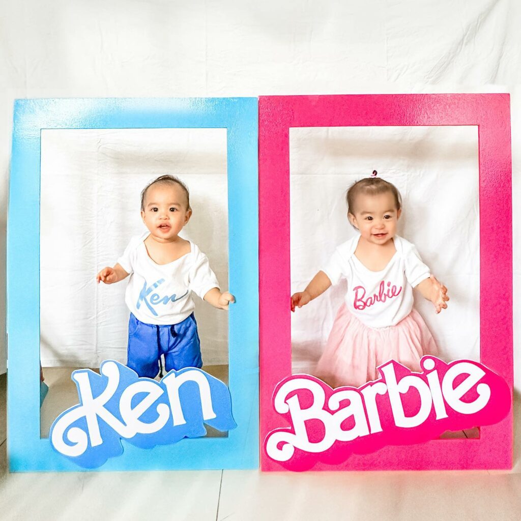 hollywood inspired costumes for twins of Ken and Barbie