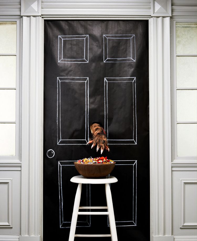 Creating a spooky candy bowl on your porch is a great way to handle trick-or-treaters while out trick-or-treating with your own kids.