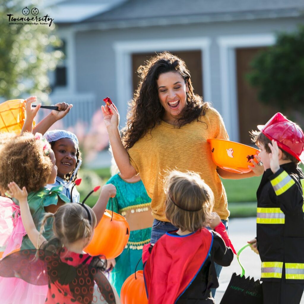 Passing out candy while out and about in the neighborhood is a great option to handle trick-or-treaters while out trick-or-treating with your kids. 