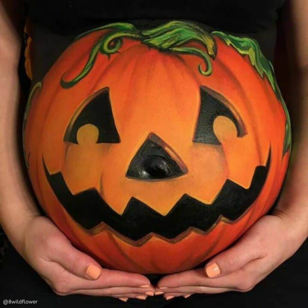 painted pumpkin baby bump us a great Halloween Costumes for Your Twin Pregnancy 