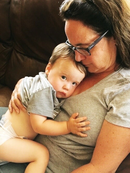 grandma holding toddler boy