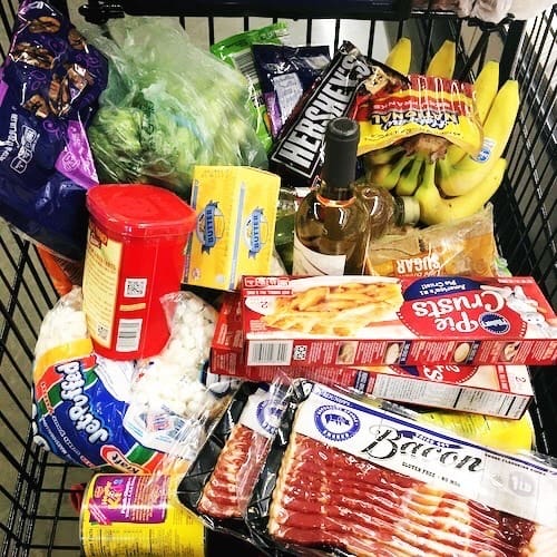 food items in a grocery store cart thanksgiving dinner