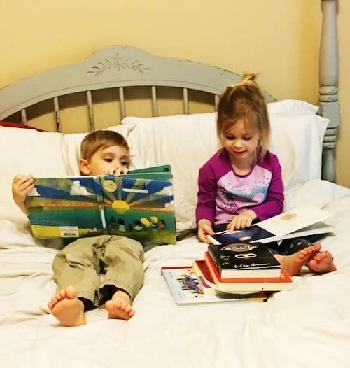 three year old twins reading books in bed kids to read