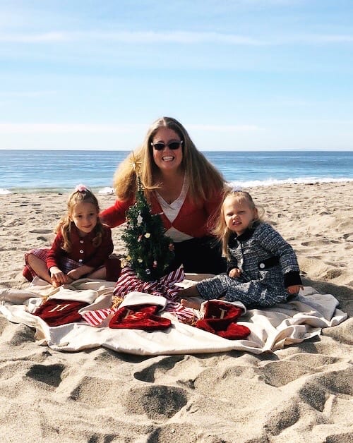 mom and twin girls on the beach christmas eve new traditions