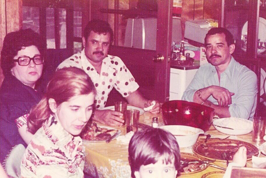 old photo of 1970s family at holiday dinner table new traditions