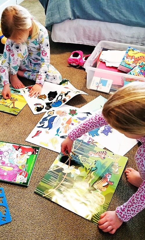 girls playing with quiet time boxes