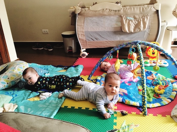 triplets on a play mat