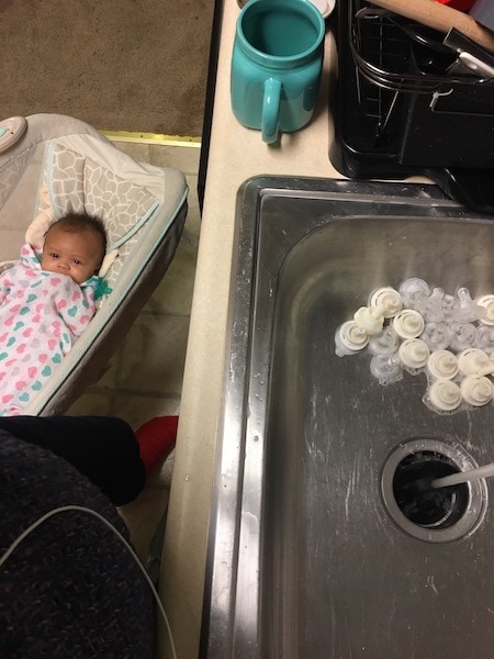 washing dishes with baby after becoming a mom