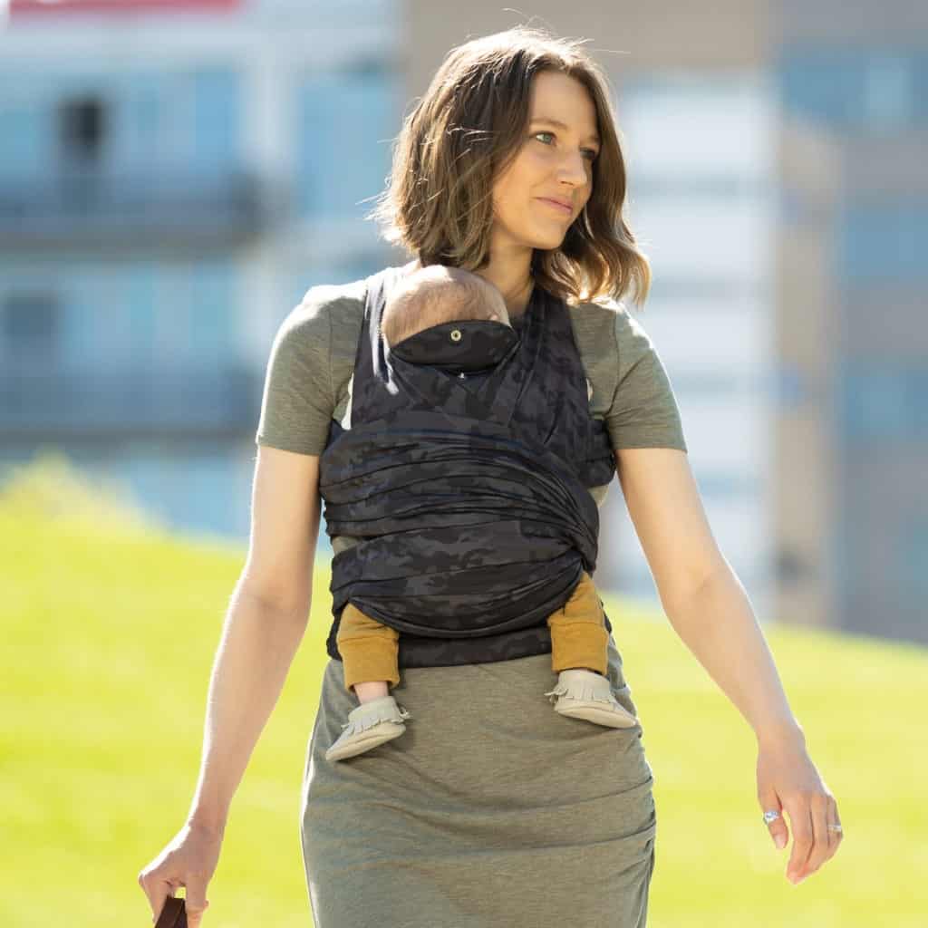 woman with baby in baby carrier