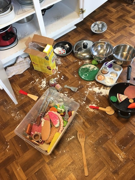 pots and pans on a kitchen floor Keep Twins Busy