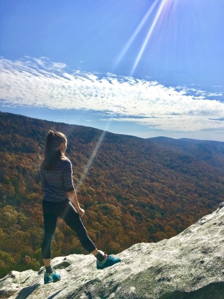 woman standing on a cliff mindfulness