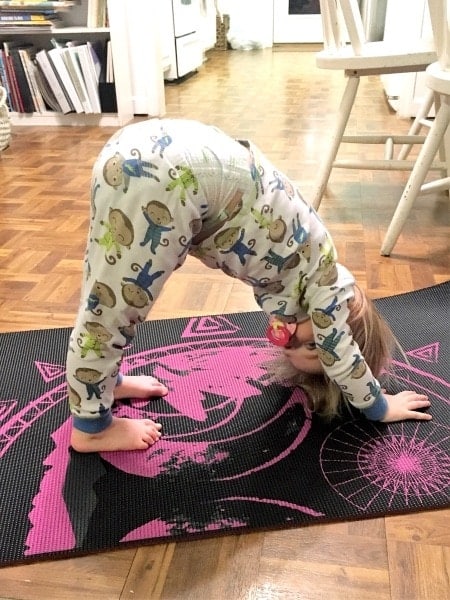 child doing yoga pose mindfulness