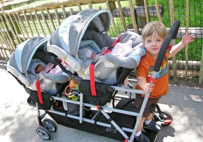 twins and toddler in double snap n go stroller reproductive assistance