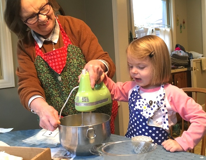 little girl cooking with grandma love of math