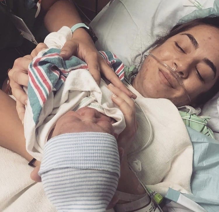 mother holding baby Double-Whammy Twin Birth