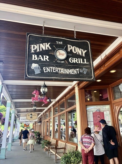 pink pony sign mackinac island lodging
