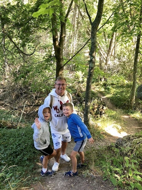 dad and sons in the woods mackinac island lodging