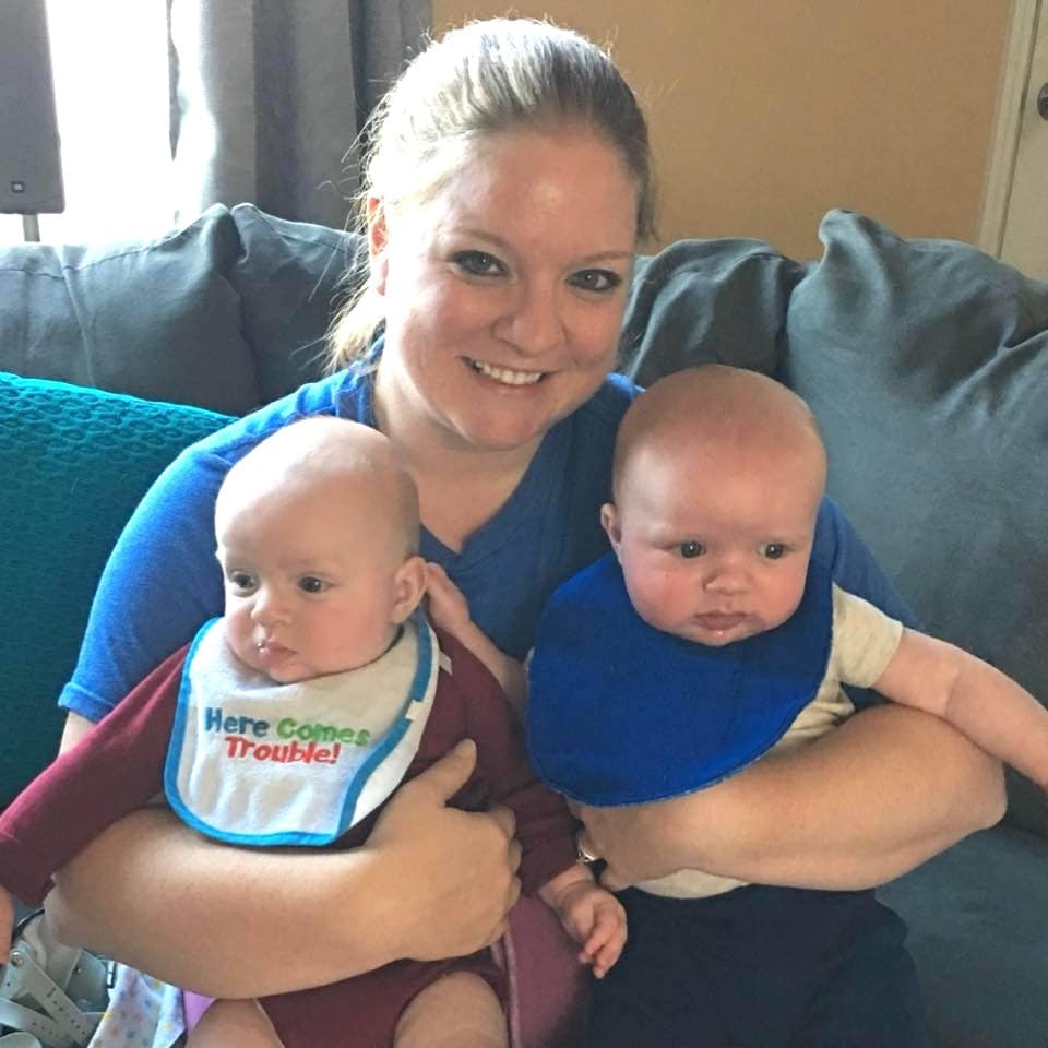 mom holding twin babies bonding with my newborn twins