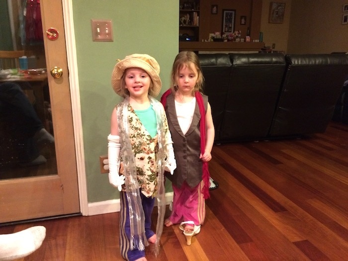 twin girls dressing up three-year-old twins