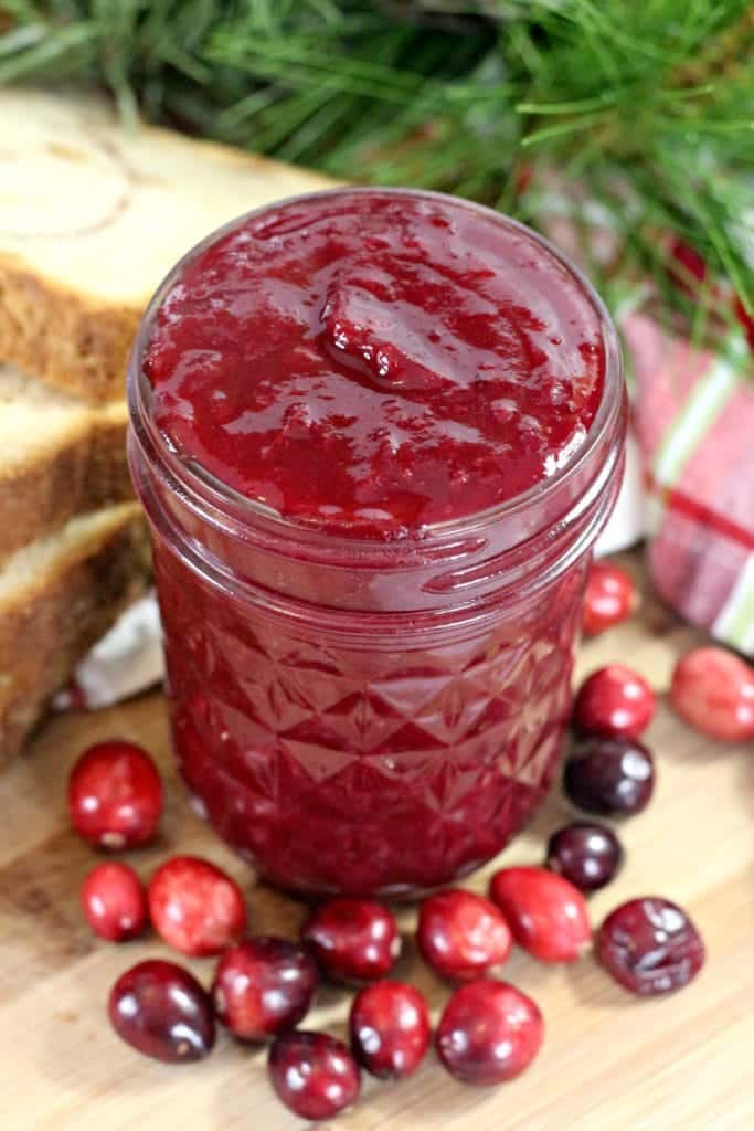 jar of cranberry jelly on a table