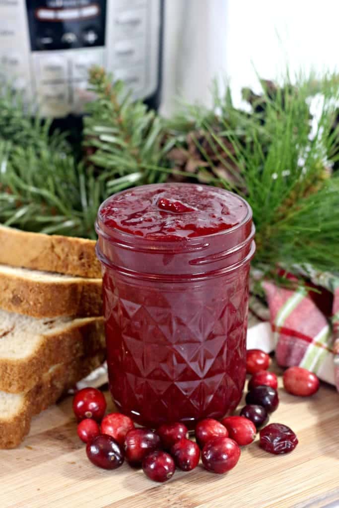 jar of cranberry jelly on a table