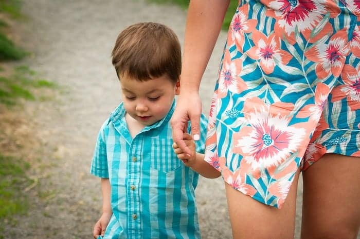 portable oxygen tank boy walking with mom