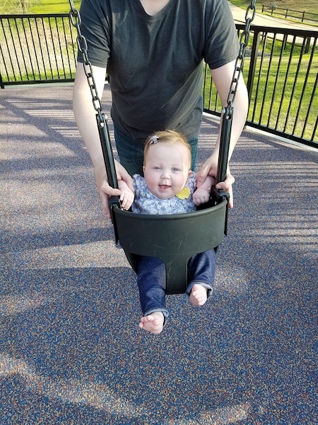 little girl in swing one on one dates