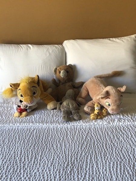 stuffed animals on a bed evacuating