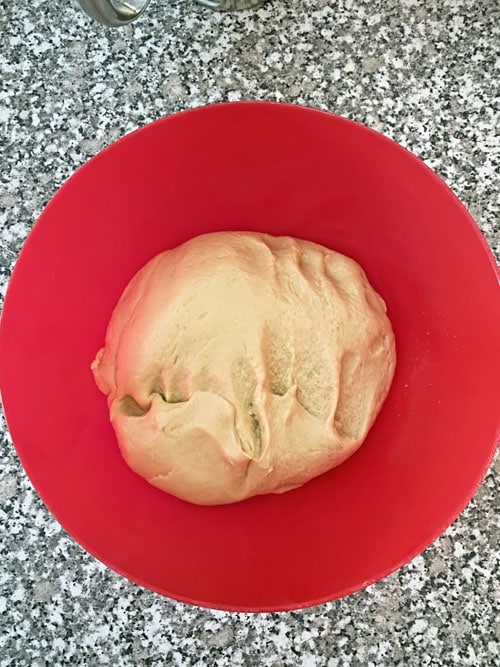 bowl with cinnamon rolls dough