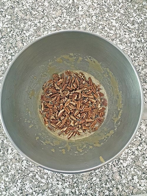 ingredients for pecan pie in a stand mixer bowl