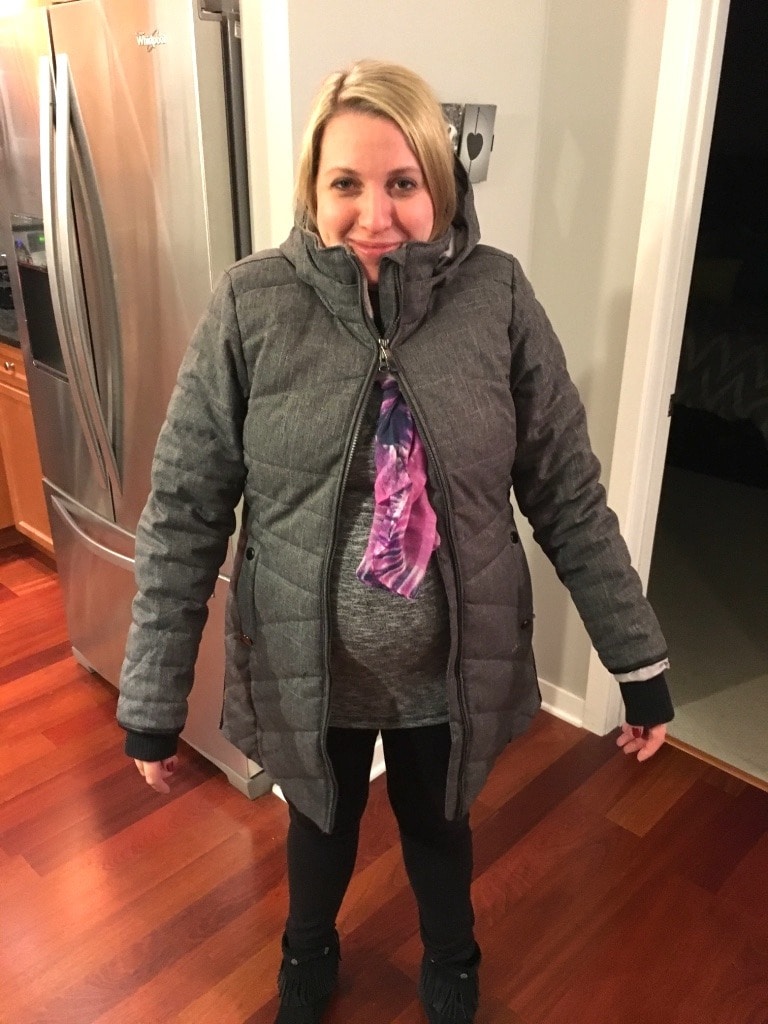 pregnant woman in a too small coat finding the humor