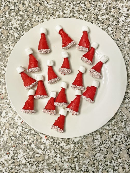 santa hats made from bugles on a white plate