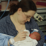 Nat bottle feeding baby in the Hospital