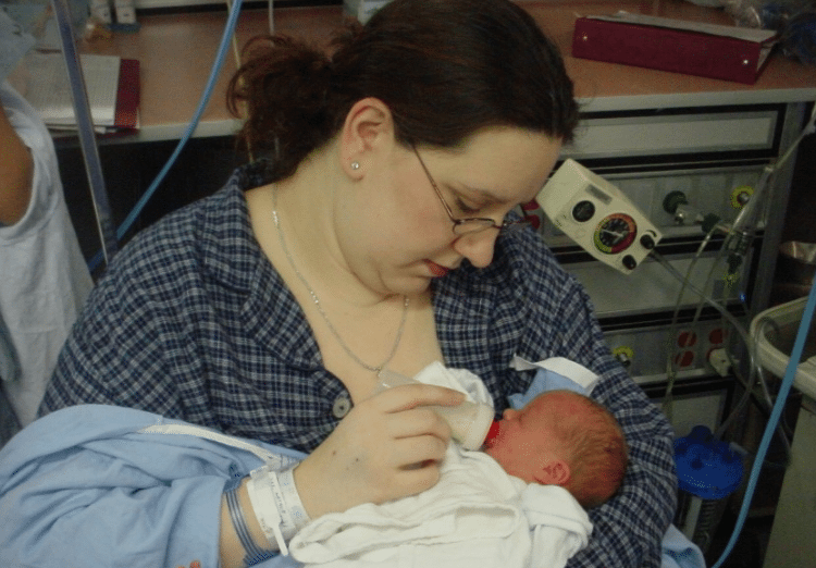 Nat bottle feeding baby in the Hospital