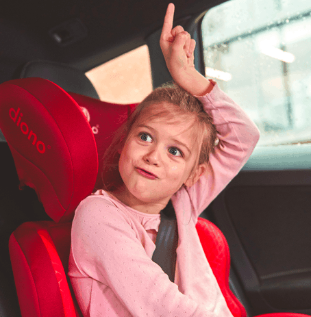 girl in car booster seat