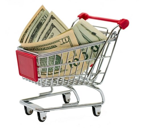 shopping cart filled with money