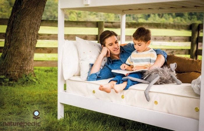 Naturepedic dad and son bunkbed reading