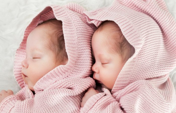 Twins sleeping in same cot hotsell
