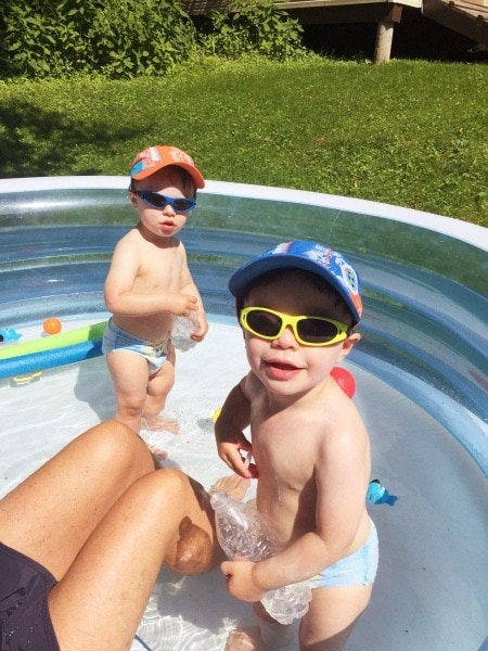 twin toddlers playing in kiddie pool baby eczema
