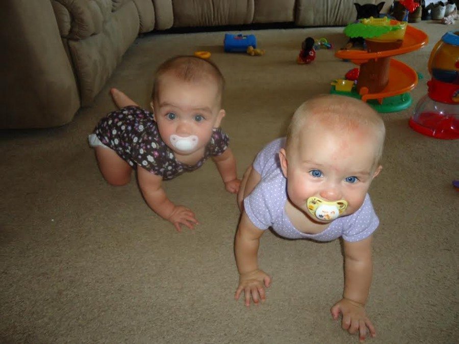 twin babies crawling off pacifiers