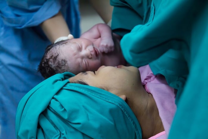 mom and new baby at delivery Recovery After Delivery