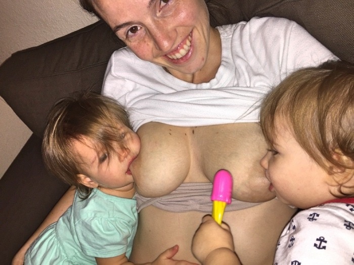 mom breastfeeding toddler twins tandem