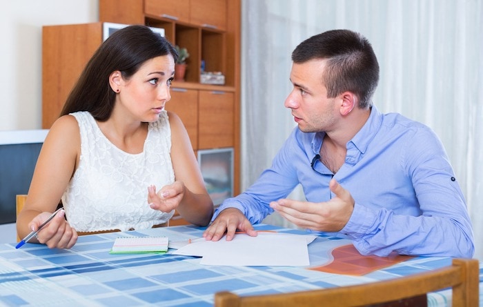 couple arguing about money financial crisis