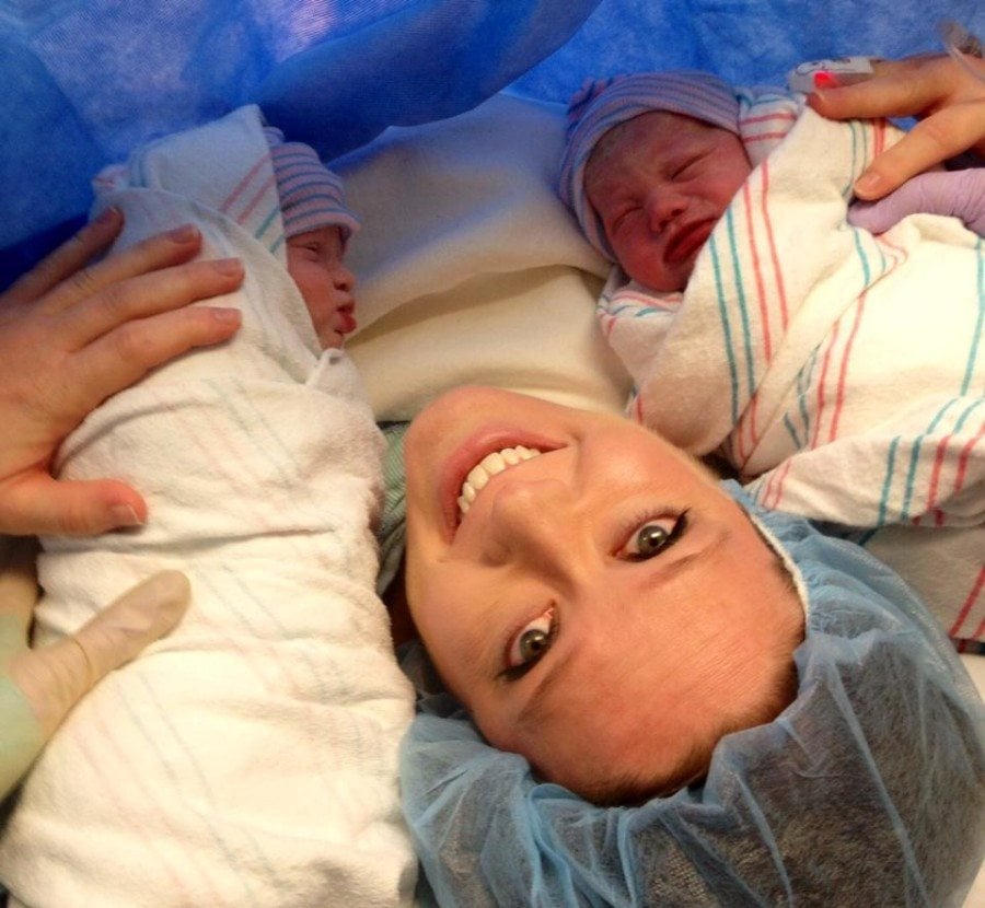 mom holding newborn twins after c-section prep tips 