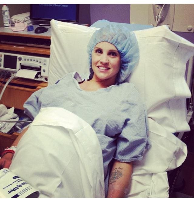 mom sitting in hospital bed before c-section prep tips