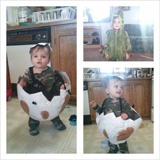 DINOSAUR AND DINOSAUR EGGS! MADE THE EGGS FROM WHITE DUCT TAPE, PAPER MACHE, AND PAINT AND PUNCHING BALLOON RUBBER BAND FOR THE STRAP ON THE HEAD PIECE ALSO -- USED THE PUNCHING BAG TO PAPER MACHE FOR EGG SHAPE