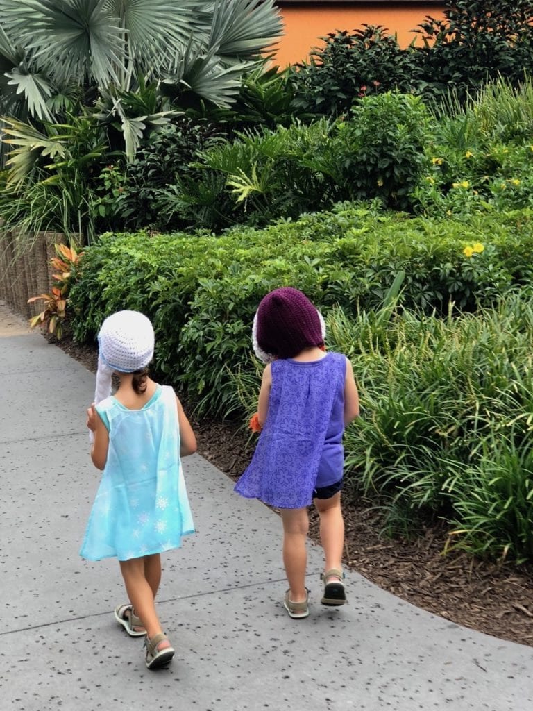 twin girls walking disney world with twins