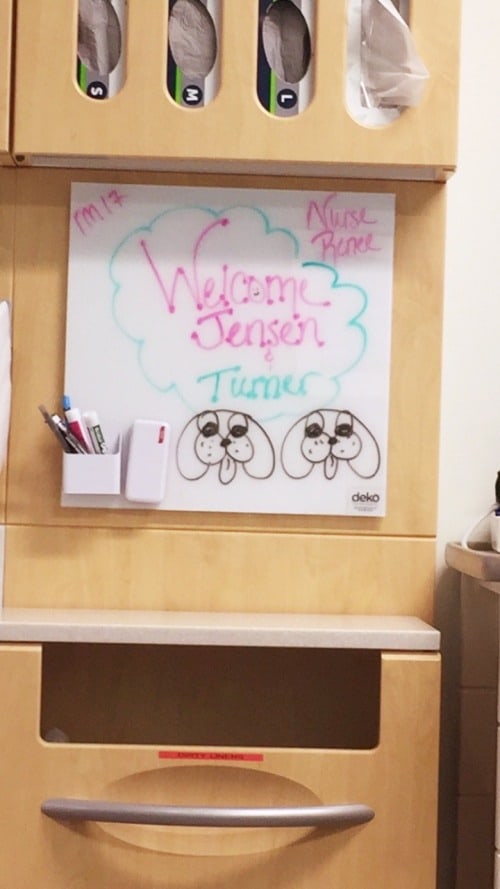 dry erase board in hospital room stating welcome jensen and turner ear tubes