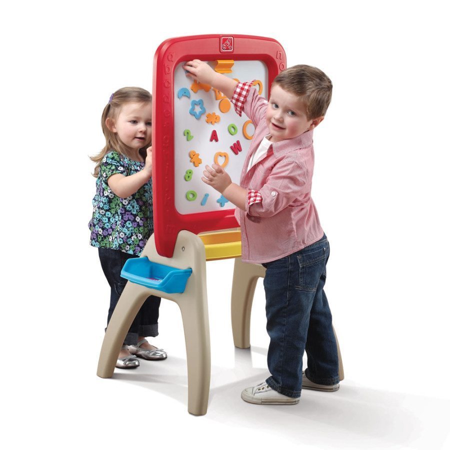 two kids playing with an easel creative play